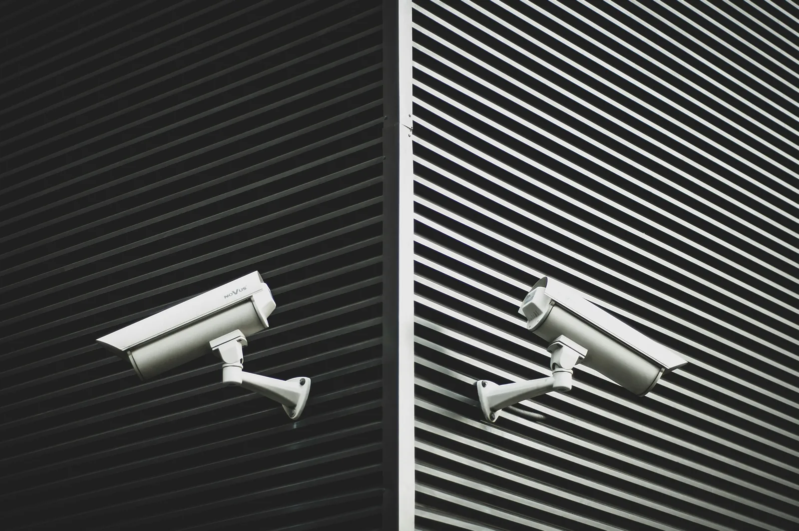 Security camera mounted above a building entrance