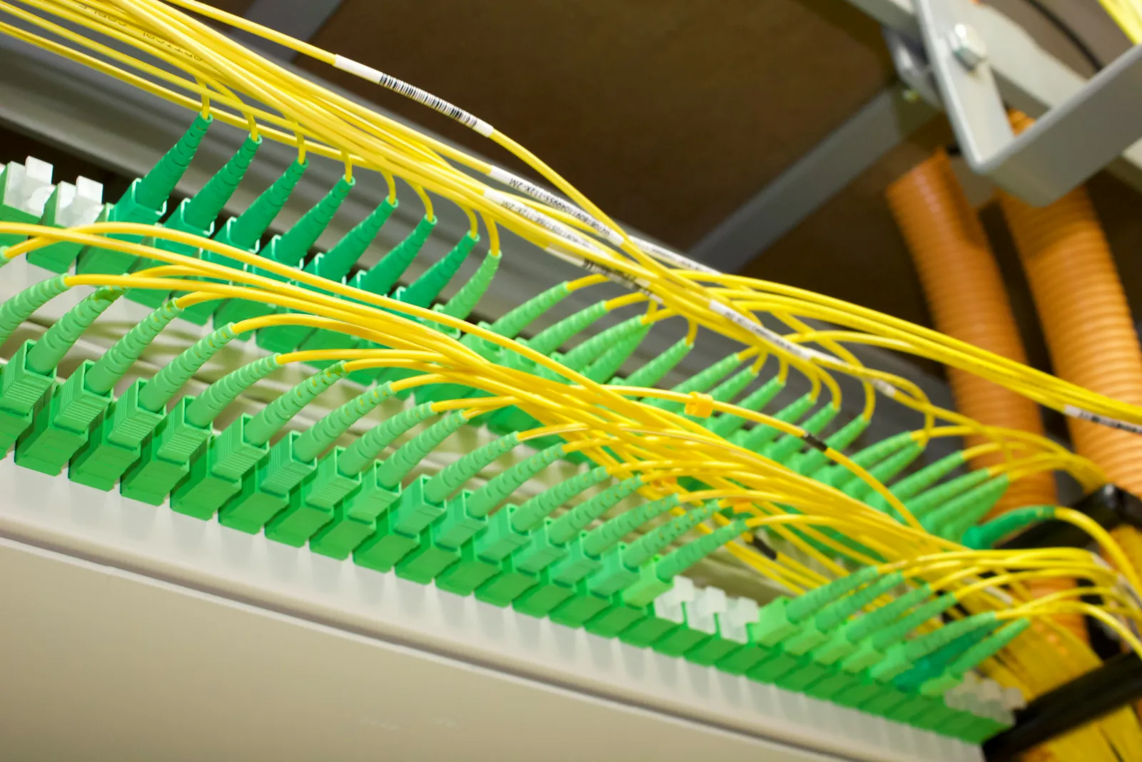 Fibre optic cable strands prepared on a work surface