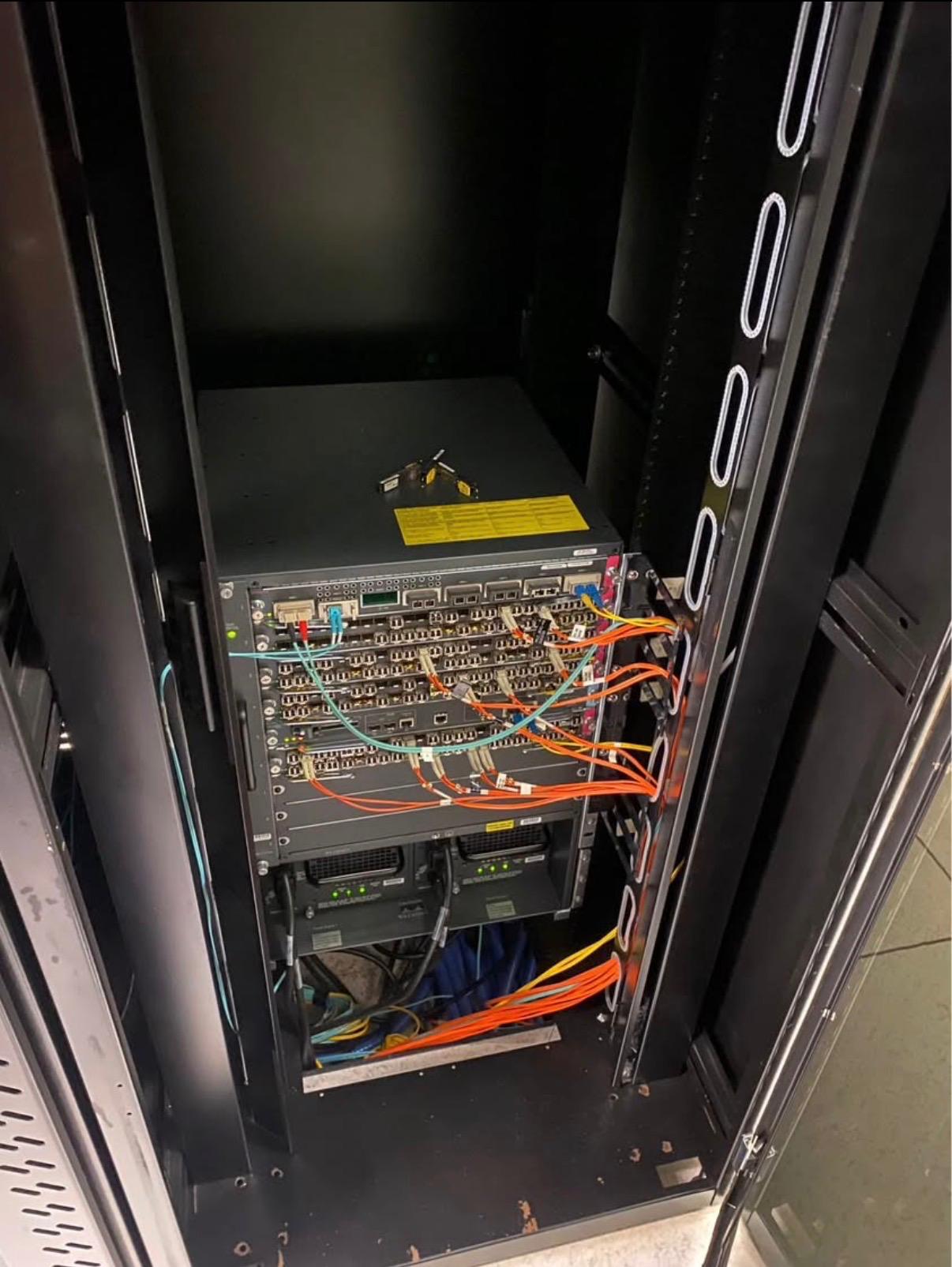 Network rack photographed before cabling work